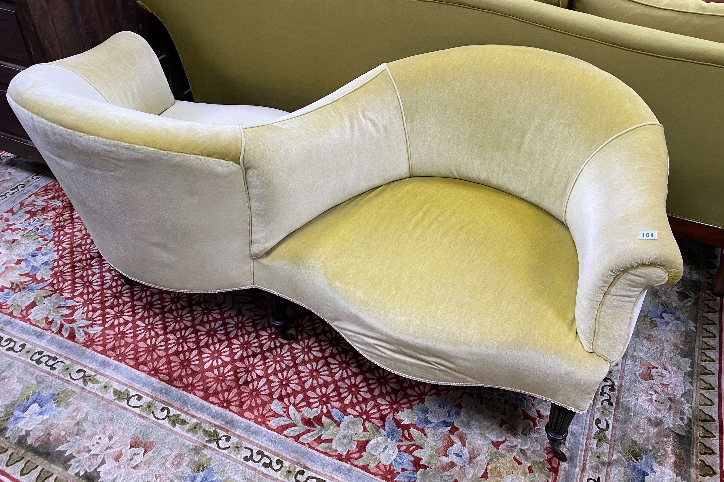 A Victorian ebonised love seat, length 164cm, depth 70cm, height 70cm